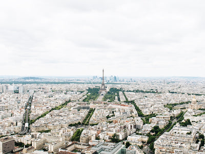 Tips for visiting Paris, with an overhead view of the city